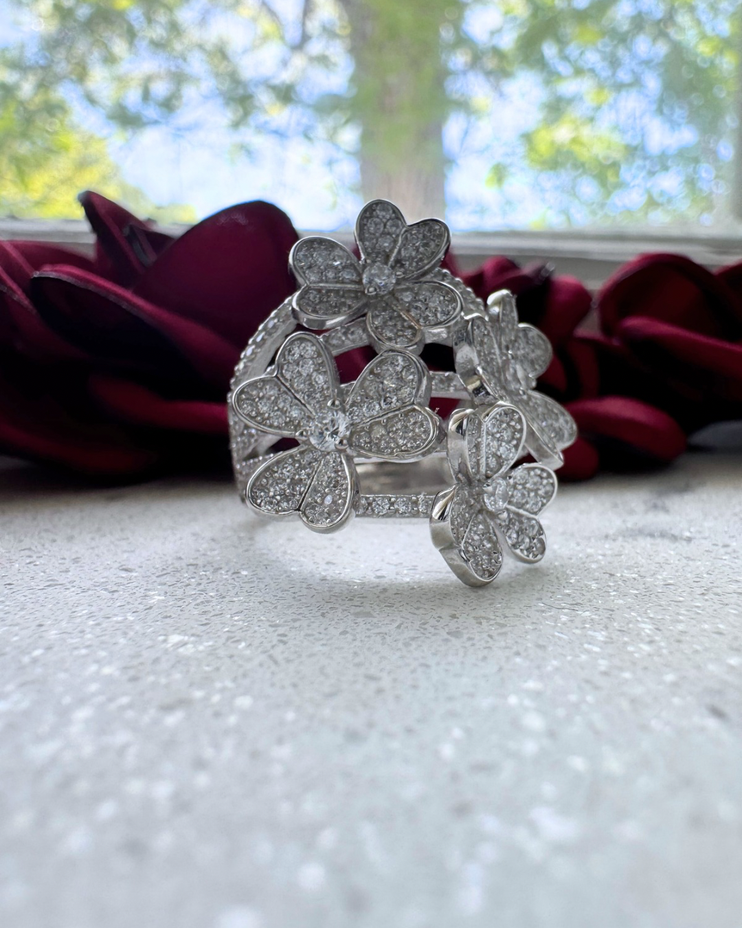 Bague enchantée avec 4 fleurs en argent 925