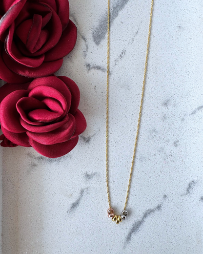 Collier hebdomadaire tricolore en or 10 carats